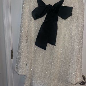 Stunning sequins white and black bow tie dress, perfect for special occasions.